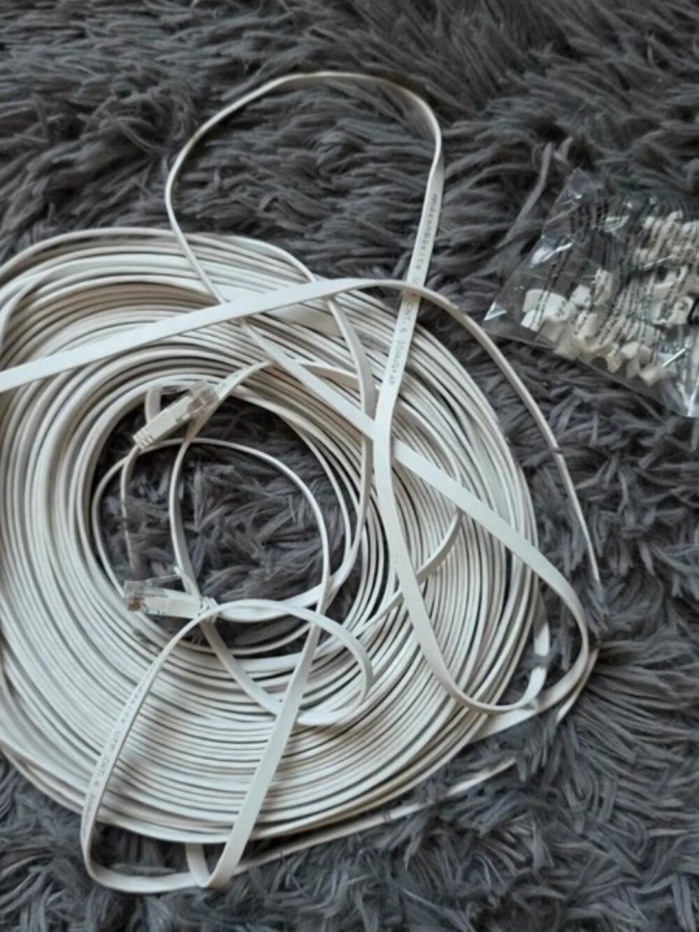Amazon Basics Cat 6 Flat RJ-45 Ethernet Patch Cable 100 ft White w/25 Nails